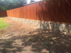 Retaining wall fence