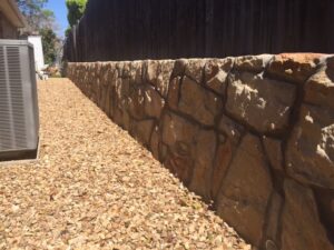 Rock retaining wall example in Bedford Texas
