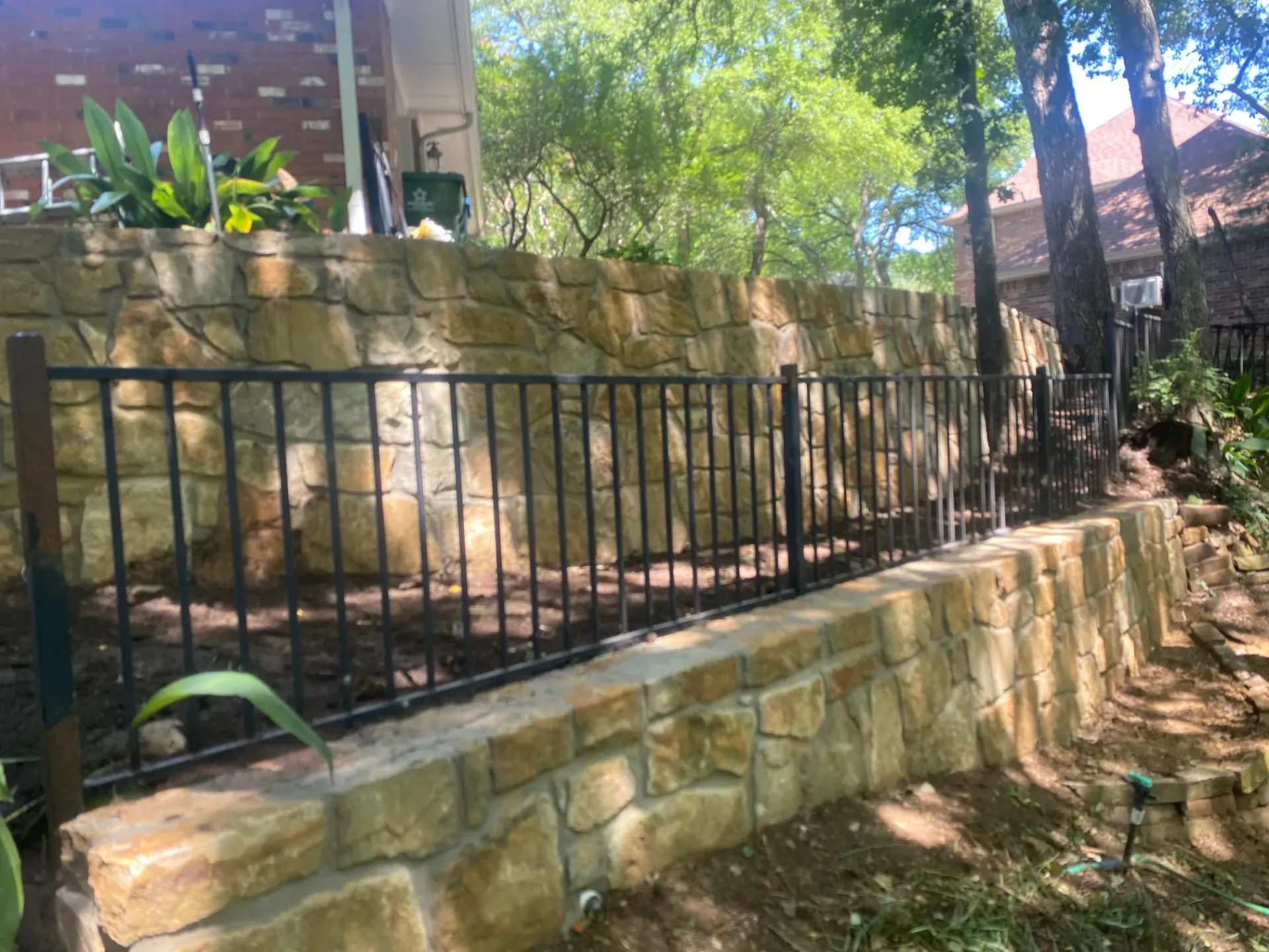 Milsap stone tiered retaining wall — a JCL Landscape Services project in the Dallas–Fort Worth metroplex