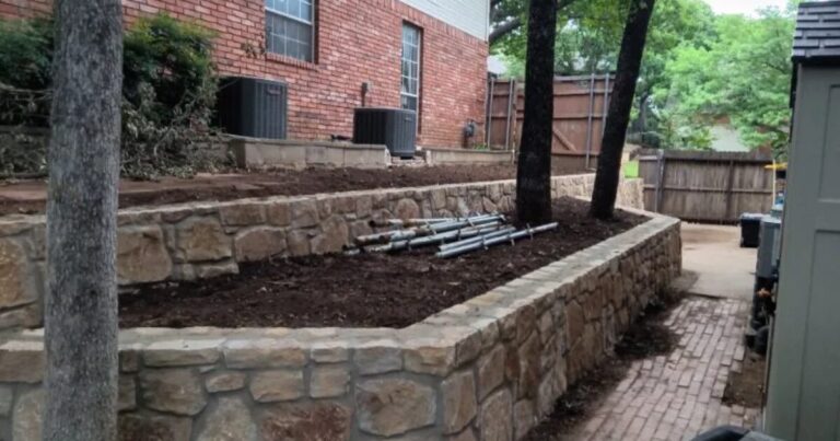 Replacing a cross tie wall with a milsap stone wall in Grapevine